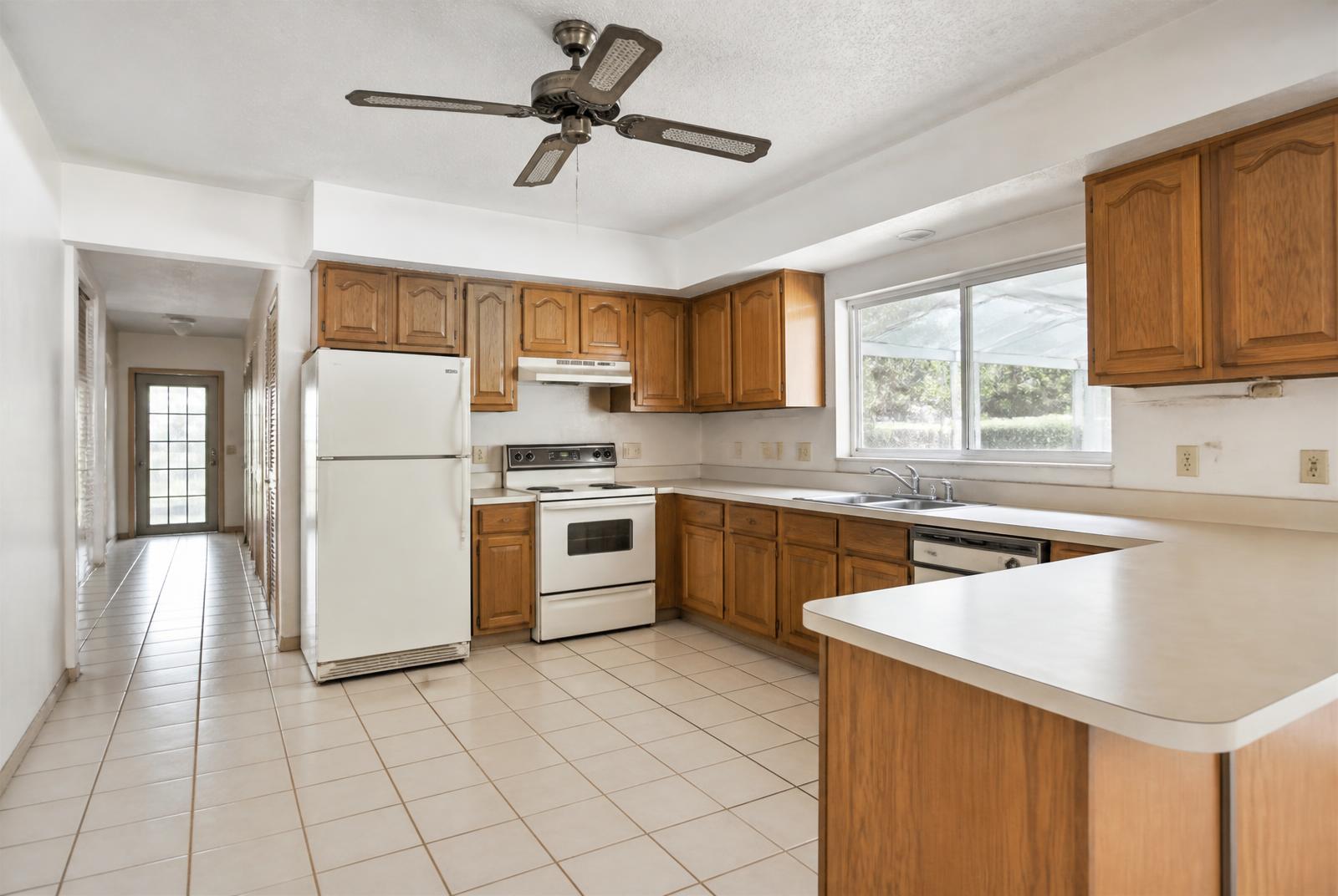 Original kitchen with oak cabinets
